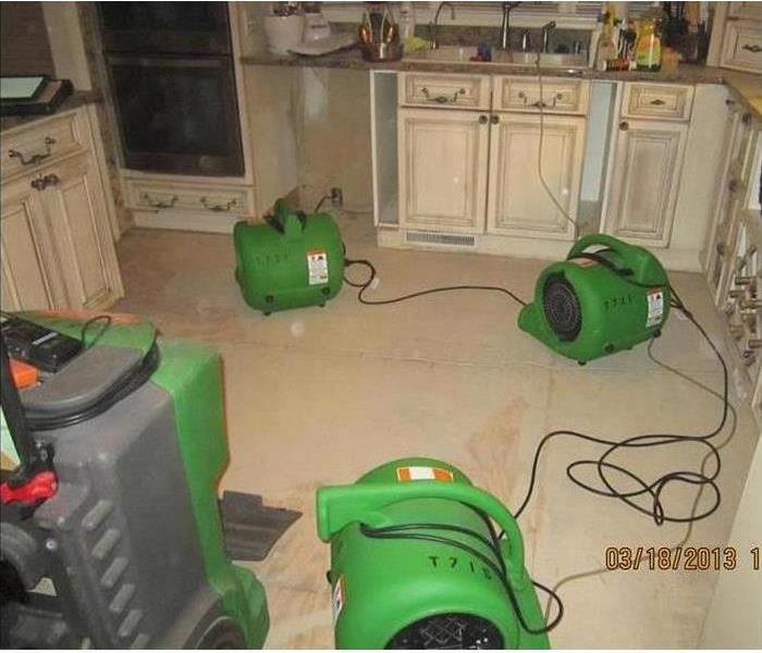 Kitchen with SERVPRO drying equipment