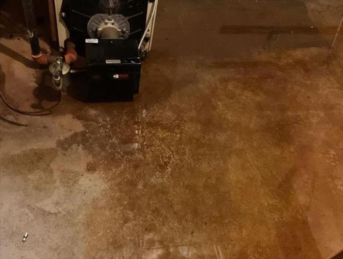 Pre mitigation water damage in boiler room 