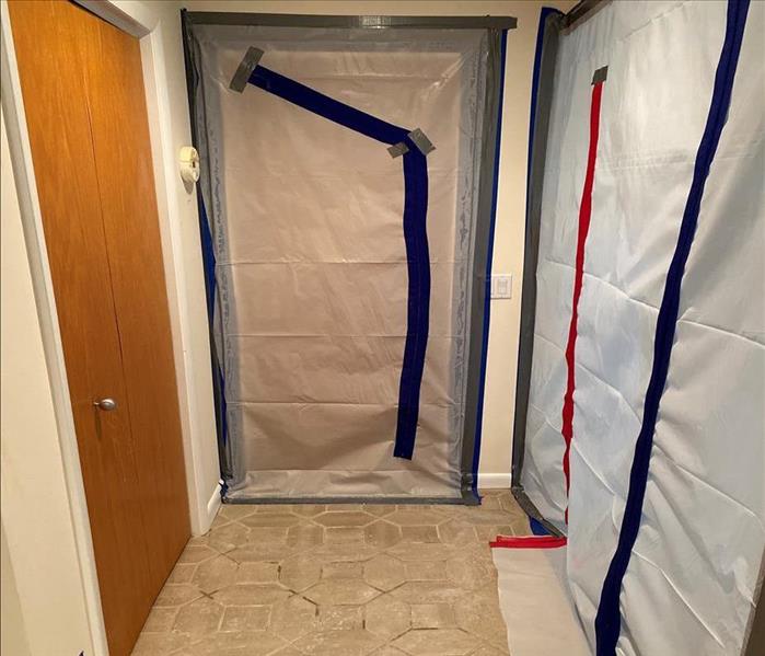 poly containment of doors in hallway