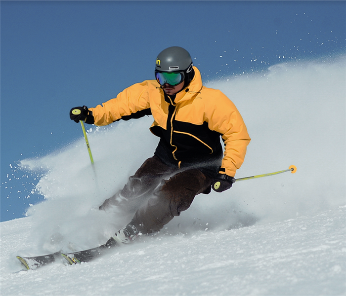 a man skiing down a mountain